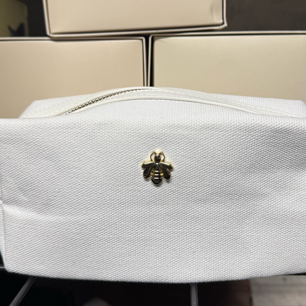 GUERLAIN White Canvas Pouch with Gold Bee Accent